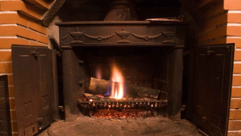 Wood fire burning in an open fireplace